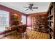 Home office with custom desk, shelving, and hardwood floors at 484 Martin Se St, Atlanta, GA 30312