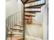 Unique spiral staircase featuring wood treads and metal railings at 484 Martin Se St, Atlanta, GA 30312