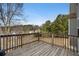 Spacious wooden deck overlooking a wooded area and residential neighborhood at 665 Sable View Ln, Atlanta, GA 30349