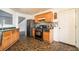 Traditional kitchen with wood cabinets, black appliances, and stylish backsplash at 665 Sable View Ln, Atlanta, GA 30349