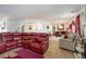 Bright and airy living room showcasing two seating areas, a fireplace and lots of light at 665 Sable View Ln, Atlanta, GA 30349