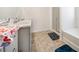 Clean bathroom with double sinks, a shower, and a soaking tub, offering a relaxing retreat at 2030 Vidalia Court, Dacula, GA 30019