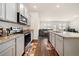 Modern kitchen featuring granite countertops, stainless steel appliances, and an open layout at 2030 Vidalia Ct, Dacula, GA 30019