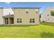 Exterior view of house with siding and a spacious, green backyard at 6119 Hickory Lane Dr, Union City, GA 30291