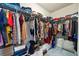 Walk-in closet features ample storage with wire shelving and organized clothing at 6119 Hickory Lane Dr, Union City, GA 30291