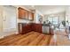 Well-appointed kitchen with stainless appliances, wood cabinets, and hardwood flooring at 6119 Hickory Lane Dr, Union City, GA 30291