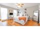 Comfortable bedroom with hardwood floors, neutral tones, and lots of natural light from the windows at 3167 Northbrook Dr, Atlanta, GA 30341