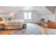 Large bedroom features hardwood floors, a gray area rug and a king size bed at 3167 Northbrook Dr, Atlanta, GA 30341