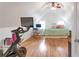 Bright bedroom offers hardwood floors and a Peloton exercise bike in the foreground at 3167 Northbrook Dr, Atlanta, GA 30341