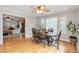 Dining area with table and chairs that opens up to the living room, filled with natural light at 3167 Northbrook Dr, Atlanta, GA 30341
