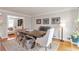 Spacious dining room featuring hardwood floors, an area rug, a table with seating for six, and light gray walls at 3167 Northbrook Dr, Atlanta, GA 30341