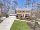 Beautiful two-story brick home with a well-manicured lawn and inviting curb appeal, perfect for families at 3167 Northbrook Dr, Atlanta, GA 30341
