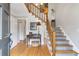 Inviting foyer featuring hardwood floors, a staircase with wood banister, and neutral wall colors, creating a welcoming entrance at 3167 Northbrook Dr, Atlanta, GA 30341