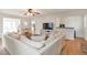 Bright living room with hardwood floors, neutral furniture, and access to kitchen and outdoor space at 3167 Northbrook Dr, Atlanta, GA 30341