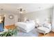 Relaxing main bedroom with a plush bed, hardwood floors, and ample space at 3167 Northbrook Dr, Atlanta, GA 30341
