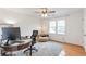 Bright office featuring hardwood floors, overhead lighting, and large monitor on desk at 3167 Northbrook Dr, Atlanta, GA 30341