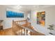 Elegant staircase with wooden railings and art-adorned walls, leading to the upper level at 3167 Northbrook Dr, Atlanta, GA 30341
