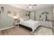 Cozy bedroom with neutral tones, decorative items, and a ceiling fan at 4273 Creekrun Cir, Buford, GA 30519