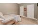 Cozy bedroom with neutral walls and a comfortable bed, ideal for relaxation at 4273 Creekrun Cir, Buford, GA 30519