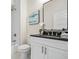 Bathroom featuring a white vanity and a shower with subway tile at 1050 Lawton Sw Ave, Atlanta, GA 30310