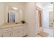 Inviting bathroom with white cabinets, tile flooring, and shower at 170 River Cove Rdg, Social Circle, GA 30025