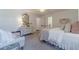 Spacious bedroom with natural light, neutral walls, and carpet flooring at 170 River Cove Rdg, Social Circle, GA 30025