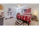 Bedroom with ceiling fan, carpet, sports decor and natural light at 170 River Cove Rdg, Social Circle, GA 30025