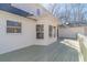 Back deck of the home featuring wood plank flooring with windows and siding at 170 River Cove Rdg, Social Circle, GA 30025