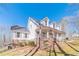 Attractive two-story home with covered porch, brick foundation, and well-maintained landscaping at 170 River Cove Rdg, Social Circle, GA 30025