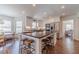 Bright kitchen featuring a center island, modern appliances, and ample counter space at 170 River Cove Rdg, Social Circle, GA 30025