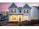 Exterior of a two-story home with white siding, a covered porch, and dark shutters at 3810 Cottage Cir, Clarkston, GA 30021