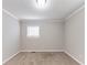 Bedroom with neutral carpet, a window, and modern paint color at 6202 Humphries Hill Rd, Austell, GA 30106