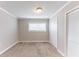 Bright bedroom with neutral carpet, crisp white trim, and natural light at 6202 Humphries Hill Rd, Austell, GA 30106