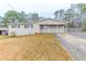 Charming one-story home featuring a covered porch and well-maintained front yard at 6202 Humphries Hill Rd, Austell, GA 30106