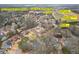 Aerial view of a suburban neighborhood showcasing nearby amenities, parks, schools, and walking trails at 6360 Brookline Ct, Cumming, GA 30040