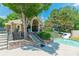 Charming clubhouse featuring a pool with slides, stone accents, and landscaped surroundings at 6360 Brookline Ct, Cumming, GA 30040