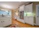 Spacious kitchen features lots of cabinets, stainless steel appliances, and breakfast nook at 6360 Brookline Ct, Cumming, GA 30040