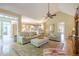 Spacious living room with high ceilings, hardwood floors, and an open layout at 6360 Brookline Ct, Cumming, GA 30040
