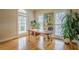 Bright office space with hardwood floors, large windows, and natural light at 6360 Brookline Ct, Cumming, GA 30040