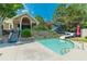 Pool with a slide near the clubhouse with stone steps and landscaping at 6360 Brookline Ct, Cumming, GA 30040