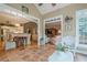 Sunroom connecting to other rooms in the home at 6360 Brookline Ct, Cumming, GA 30040