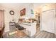 Modern kitchen featuring quartz countertops, stainless steel appliances, and breakfast bar seating at 999 Chestnut Oak Ct, Lawrenceville, GA 30046