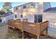 A spacious wooden back deck provides outdoor living space and enhances the home's appeal at 7025 Kimberly Mill Rd, Atlanta, GA 30349