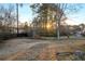 The backyard features natural light, trees, and potential for outdoor enjoyment at 7025 Kimberly Mill Rd, Atlanta, GA 30349