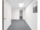 The finished basement includes carpeted floors, creating a comfortable living area at 7025 Kimberly Mill Rd, Atlanta, GA 30349