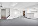 This finished basement area offers a large recreation space and additional storage at 7025 Kimberly Mill Rd, Atlanta, GA 30349