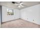 Bedroom with a ceiling fan and ample natural light from the window at 7025 Kimberly Mill Rd, Atlanta, GA 30349