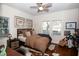 Cozy bedroom featuring hardwood floors, natural light, and a golf-themed decor at 981 Church St, Decatur, GA 30030