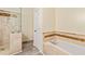 Bathroom with tiled shower and separate tub at 2002 Wingate Rd, Atlanta, GA 30341