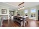 Charming dining room with unique light fixture, beautiful floors, and plenty of natural light at 2002 Wingate Rd, Atlanta, GA 30341